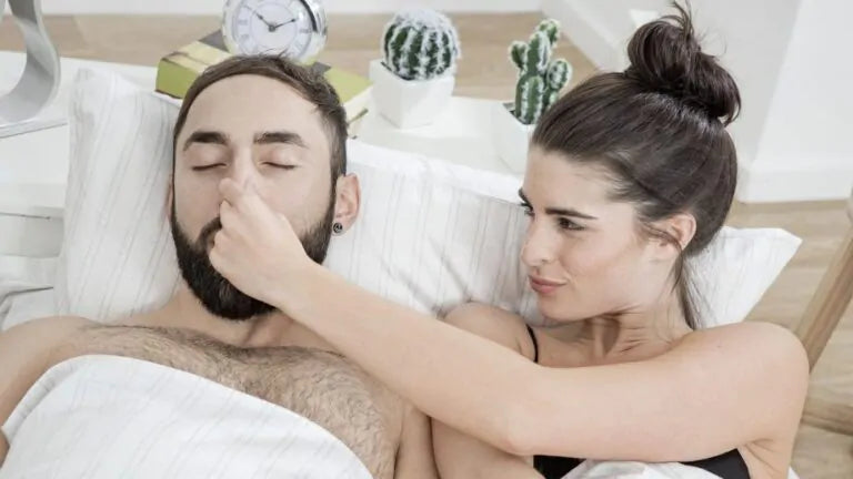 pinching snorers nose