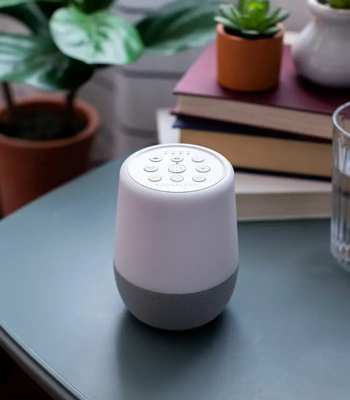 Yogasleep Duet Bluetooth White Noise Machine with night light, designed for restful sleep, baby nurseries, and travel use