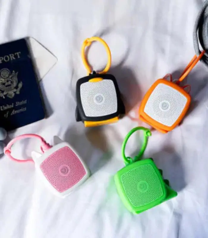 Yogasleep Pocket Baby Soother Sound Machine with calming lullabies and soothing sounds to help babies sleep peacefully on the go