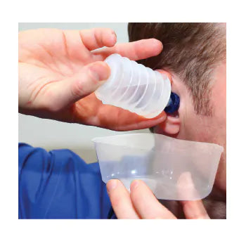 Man holding Mack's Pro Rinse Earwax Removal Kit