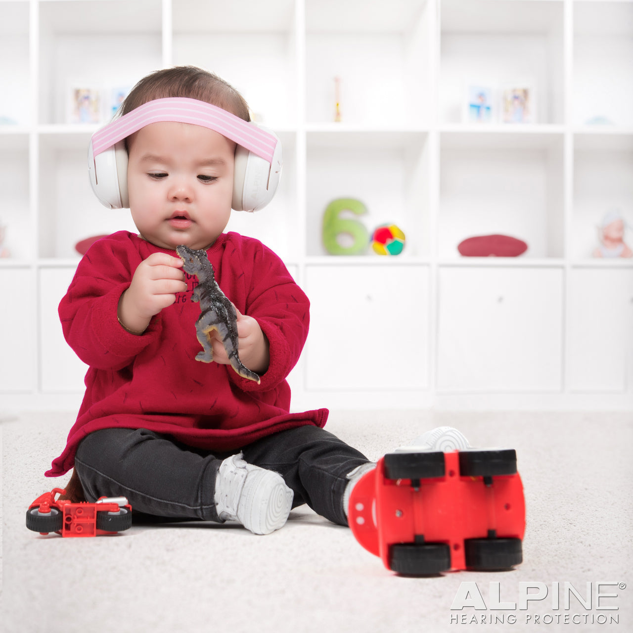Baby wearing Alpine Muffy Baby Earmuffs