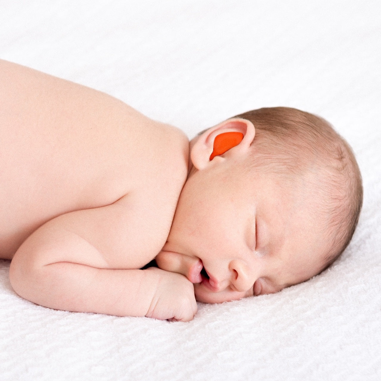 Baby wearing Mack's Childrens Pillow Soft Ear Plugs for Noise or Swimming - Kids Size - 6 Pair
