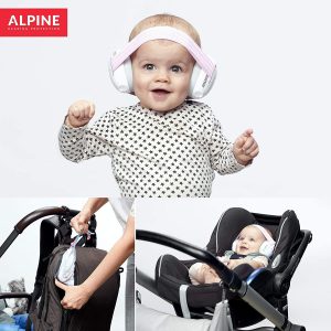 baby wearing white earmuffs