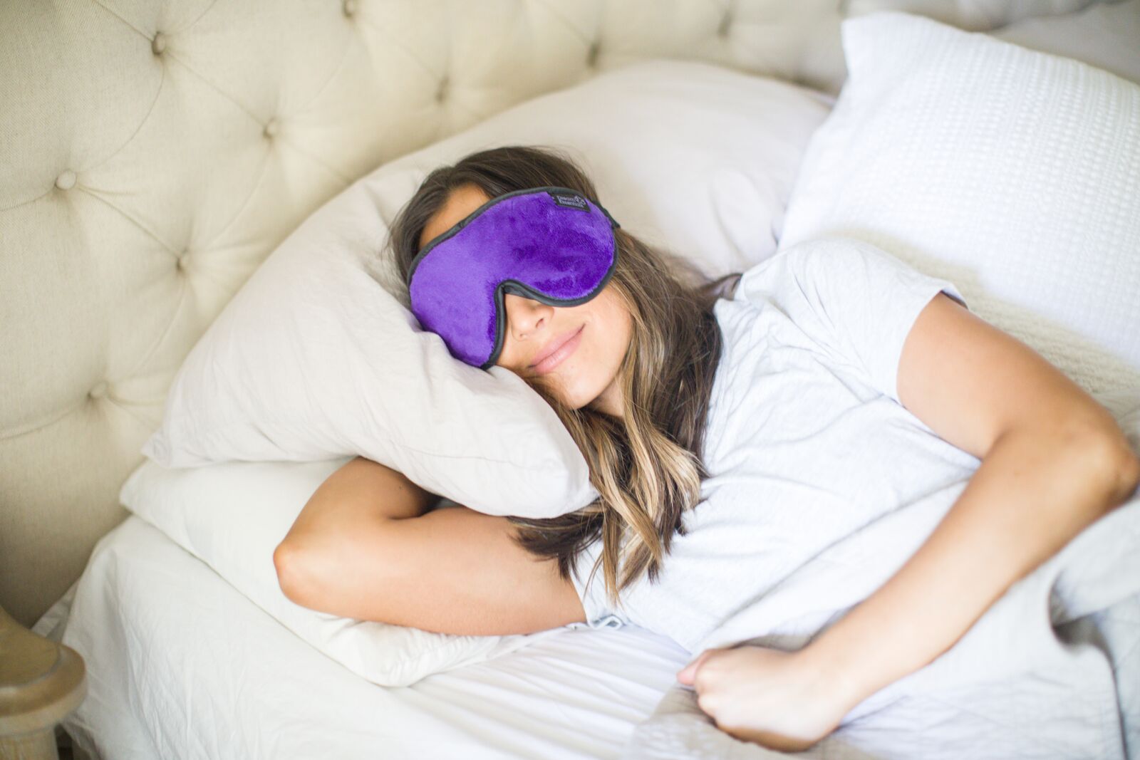 lady wearing purple sleep mask