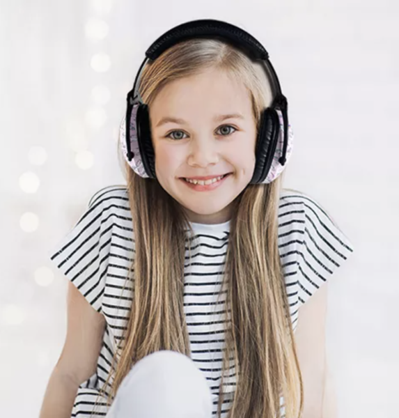 Girl Wearing Hushies noise cancelling Earmuffs for kids