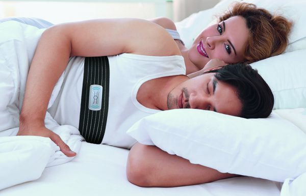 man wearing oscimed anti snoring belt