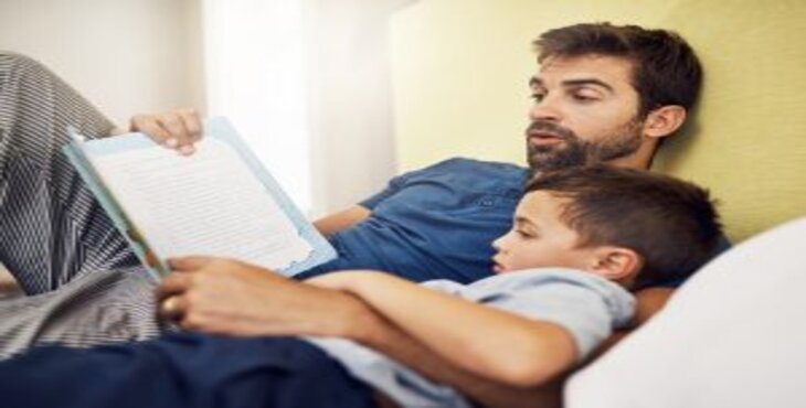 man reading to child 300x225 1